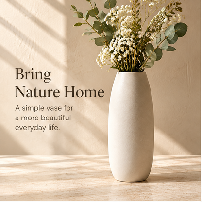 Close-up of the ivory ceramic vase rim, smooth curves and matte texture.